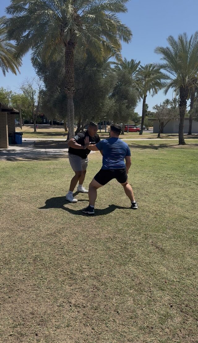 Athletes running a pass-pro rep
