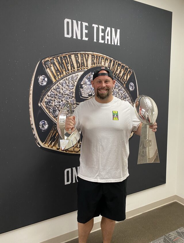 AQ Shipley with the Lombardi Trophy